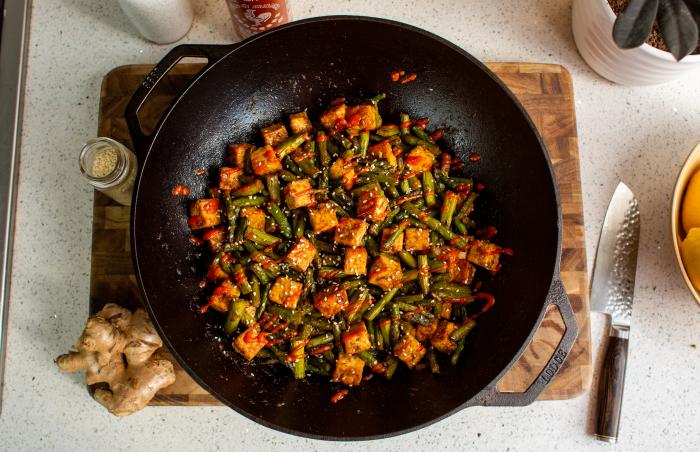 A vegetable stir-fry cooked in my Lodge cast iron mini wok. Served in my  Lodge loop handle pans.